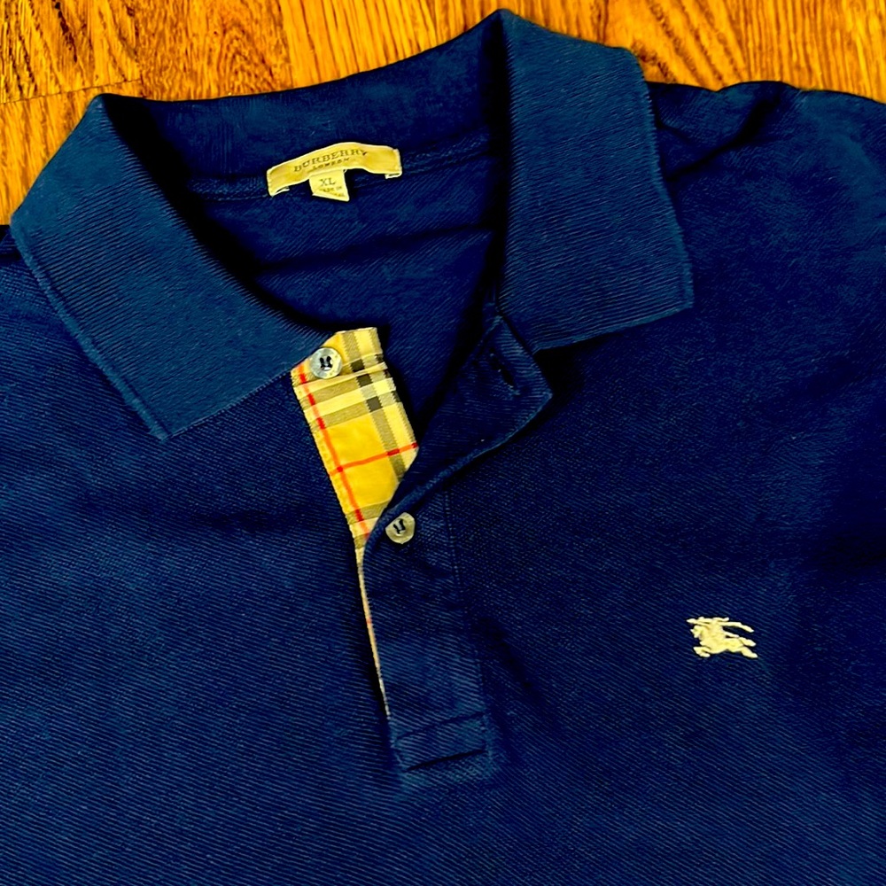 Burberry London Men’s XL Navy shirt sleeve polo shirt.
